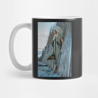 Sexy woman in cardigan on the sea shore Mug